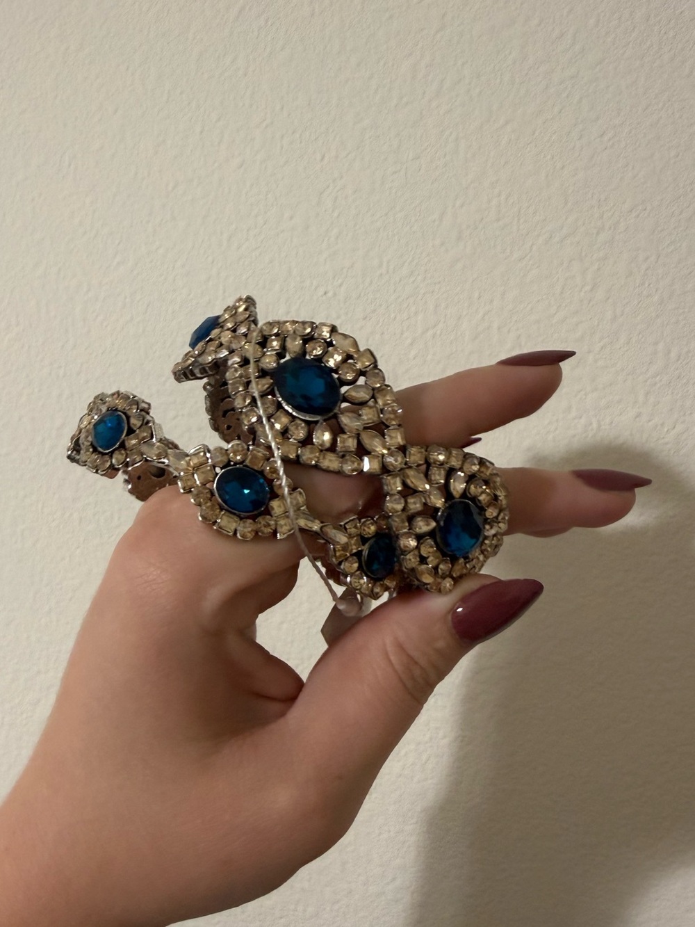 Sassy Jones Gold-Tone bracelet with Sapphire Blue Stones